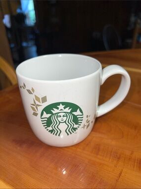 Starbucks White Mug with Green Logo and Gold Accents